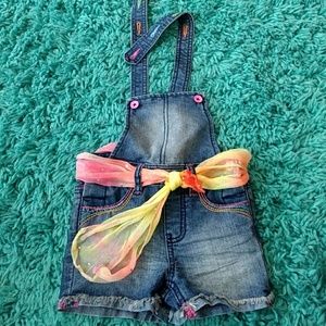 Girls jean jumper with rainbow accessories/detail